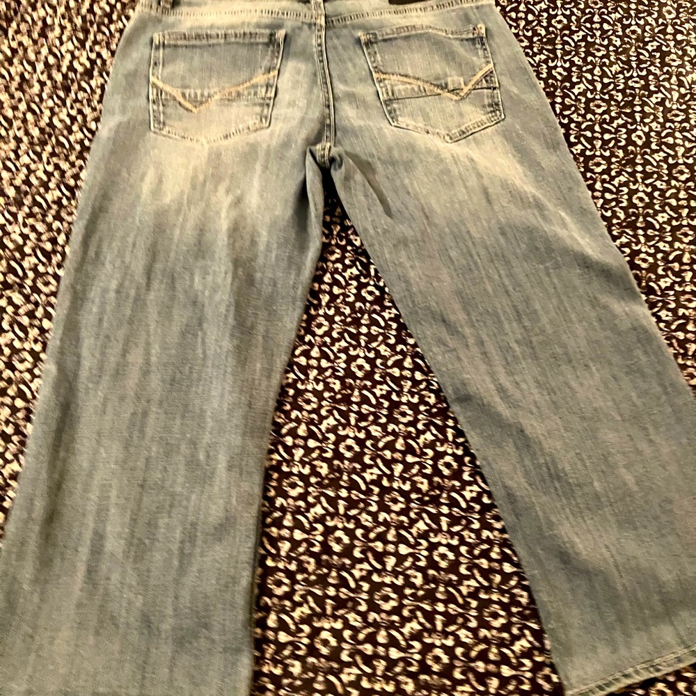 Buckle tailored jean waist is 29